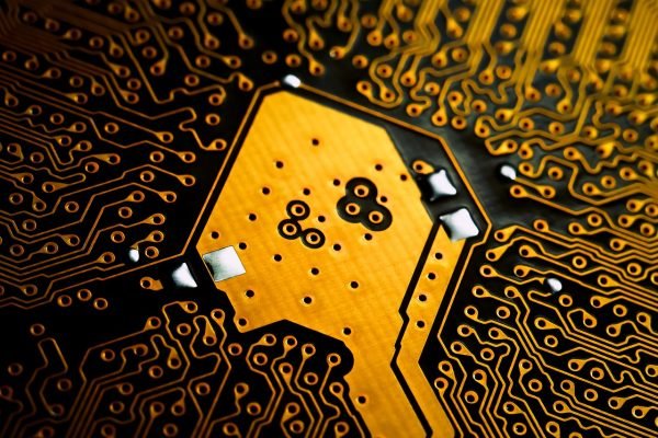 A close up of a semiconductors circuit board.